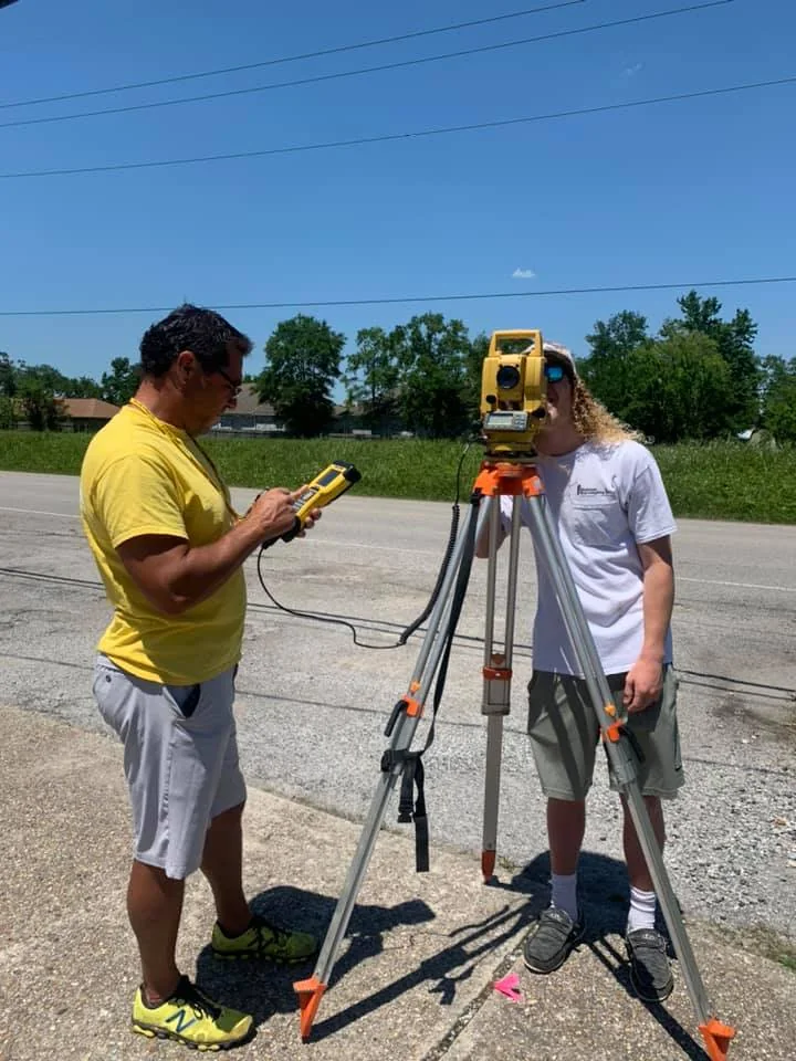 Boundary Surveys, professional surveying team at work